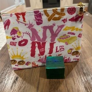 Sun & Moon Rewind & Replenish Eye Treatment & Maybelline NY Cosmetic  Bag